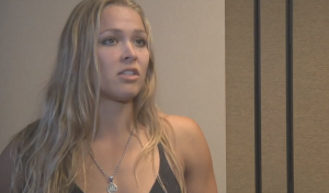 Two-time Olympian Ronda Rousey wins in the midst of controversy