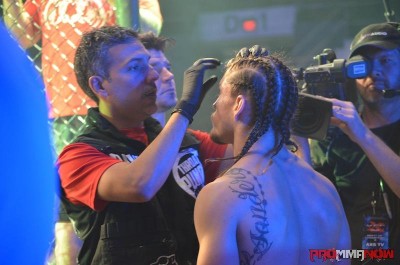 Cutman David Maldonado prepping MMA fighter Luke Sanders